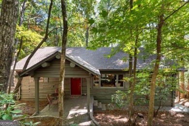This is a light and bright, fully renovated, real log cabin in on Big Canoe Golf Club - Cherokee in Georgia - for sale on GolfHomes.com, golf home, golf lot