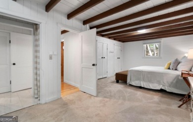 This is a light and bright, fully renovated, real log cabin in on Big Canoe Golf Club - Cherokee in Georgia - for sale on GolfHomes.com, golf home, golf lot