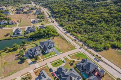 5-acre corner lot with a picturesque view in the scenic Lake on Tangle Ridge Golf Club in Texas - for sale on GolfHomes.com, golf home, golf lot