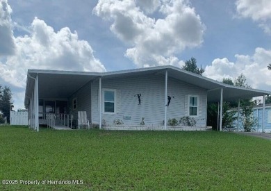 CHARMING 3-BEDROOM HOME located in the desirable gated on Brookridge Country Club in Florida - for sale on GolfHomes.com, golf home, golf lot