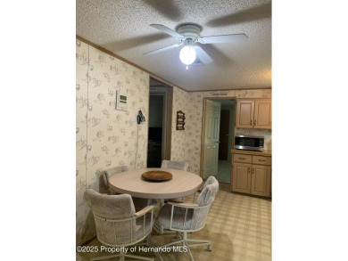 CHARMING 3-BEDROOM HOME located in the desirable gated on Brookridge Country Club in Florida - for sale on GolfHomes.com, golf home, golf lot