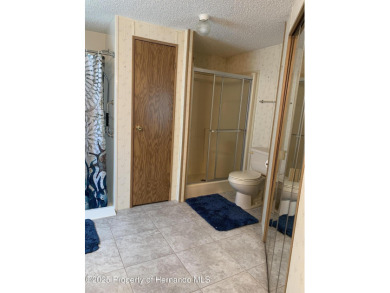 CHARMING 3-BEDROOM HOME located in the desirable gated on Brookridge Country Club in Florida - for sale on GolfHomes.com, golf home, golf lot