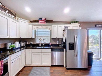 This charming property offers the perfect blend of comfort and on Citrus Springs Country Club in Florida - for sale on GolfHomes.com, golf home, golf lot