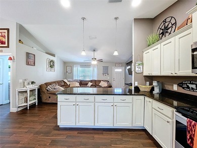 This charming property offers the perfect blend of comfort and on Citrus Springs Country Club in Florida - for sale on GolfHomes.com, golf home, golf lot