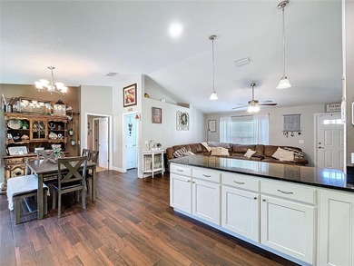 This charming property offers the perfect blend of comfort and on Citrus Springs Country Club in Florida - for sale on GolfHomes.com, golf home, golf lot