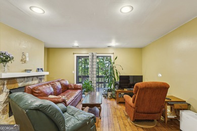 Step into resort-style living with this charming 2-bedroom, 2 on The Highlands Course at Lake Arrowhead in Georgia - for sale on GolfHomes.com, golf home, golf lot