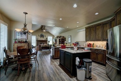 Welcome to this breathtaking 4-bedroom, 3-bathroom home located on Shawnee Country Club in Oklahoma - for sale on GolfHomes.com, golf home, golf lot