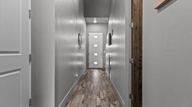 Luxury townhome just steps away from the award winning Redlands on The Golf Club At Redlands Mesa in Colorado - for sale on GolfHomes.com, golf home, golf lot