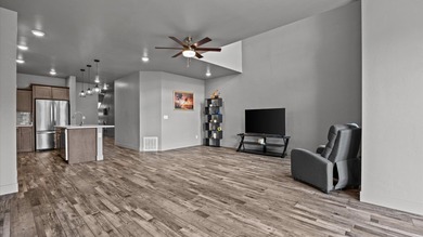 Luxury townhome just steps away from the award winning Redlands on The Golf Club At Redlands Mesa in Colorado - for sale on GolfHomes.com, golf home, golf lot