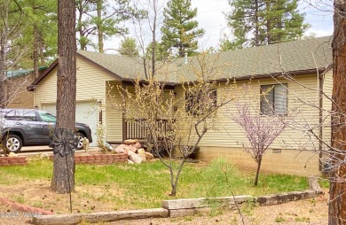 Charming Mountain Retreat nestled in the serene Fairway Park on Bison Golf and Country Club in Arizona - for sale on GolfHomes.com, golf home, golf lot