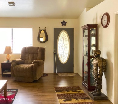 Charming Mountain Retreat nestled in the serene Fairway Park on Bison Golf and Country Club in Arizona - for sale on GolfHomes.com, golf home, golf lot