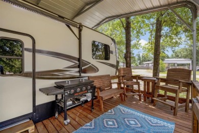 Sit back on your covered porch and soak in the breathtaking on Links At Lands End in Texas - for sale on GolfHomes.com, golf home, golf lot