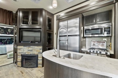 Sit back on your covered porch and soak in the breathtaking on Links At Lands End in Texas - for sale on GolfHomes.com, golf home, golf lot