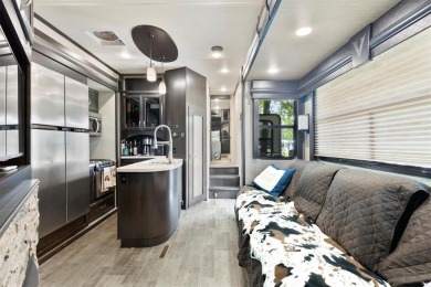 Sit back on your covered porch and soak in the breathtaking on Links At Lands End in Texas - for sale on GolfHomes.com, golf home, golf lot