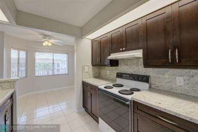 A beautiful lake view 2/2 unit on the top 4th floor located in on Flamingo Lakes Country Club in Florida - for sale on GolfHomes.com, golf home, golf lot