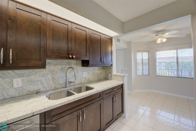 A beautiful lake view 2/2 unit on the top 4th floor located in on Flamingo Lakes Country Club in Florida - for sale on GolfHomes.com, golf home, golf lot