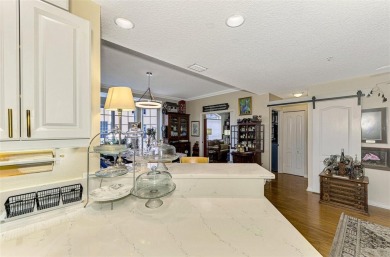 Appealing two bedroom, plus den, two bath condo with a two car on Capri Isle Golf Club in Florida - for sale on GolfHomes.com, golf home, golf lot