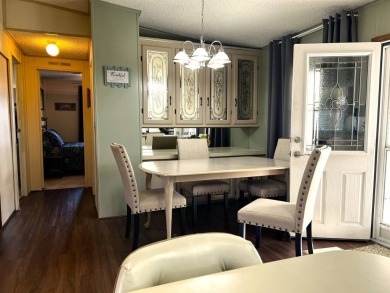Discover your ideal retreat with this meticulously designed on Lake Henry Golf Club in Florida - for sale on GolfHomes.com, golf home, golf lot