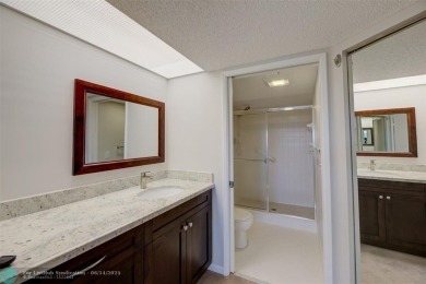A beautiful lake view 2/2 unit on the top 4th floor located in on Flamingo Lakes Country Club in Florida - for sale on GolfHomes.com, golf home, golf lot