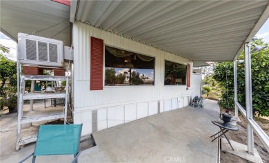 Great manufactured home sitting elevated up on the golf course on Arroyo Fairways Club and Golf Course in California - for sale on GolfHomes.com, golf home, golf lot