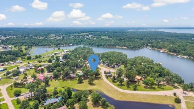 Sit back on your covered porch and soak in the breathtaking on Links At Lands End in Texas - for sale on GolfHomes.com, golf home, golf lot