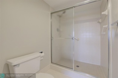 A beautiful lake view 2/2 unit on the top 4th floor located in on Flamingo Lakes Country Club in Florida - for sale on GolfHomes.com, golf home, golf lot