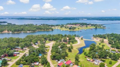Sit back on your covered porch and soak in the breathtaking on Links At Lands End in Texas - for sale on GolfHomes.com, golf home, golf lot