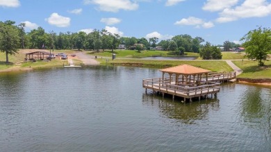 Sit back on your covered porch and soak in the breathtaking on Links At Lands End in Texas - for sale on GolfHomes.com, golf home, golf lot