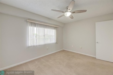 A beautiful lake view 2/2 unit on the top 4th floor located in on Flamingo Lakes Country Club in Florida - for sale on GolfHomes.com, golf home, golf lot