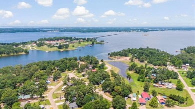 Sit back on your covered porch and soak in the breathtaking on Links At Lands End in Texas - for sale on GolfHomes.com, golf home, golf lot