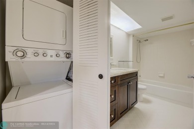 A beautiful lake view 2/2 unit on the top 4th floor located in on Flamingo Lakes Country Club in Florida - for sale on GolfHomes.com, golf home, golf lot