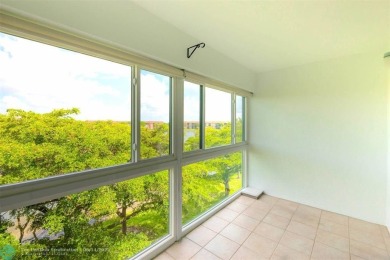 A beautiful lake view 2/2 unit on the top 4th floor located in on Flamingo Lakes Country Club in Florida - for sale on GolfHomes.com, golf home, golf lot