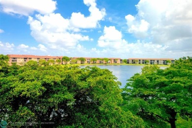 A beautiful lake view 2/2 unit on the top 4th floor located in on Flamingo Lakes Country Club in Florida - for sale on GolfHomes.com, golf home, golf lot