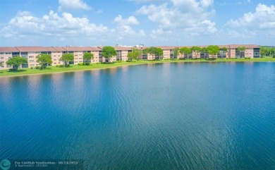 A beautiful lake view 2/2 unit on the top 4th floor located in on Flamingo Lakes Country Club in Florida - for sale on GolfHomes.com, golf home, golf lot