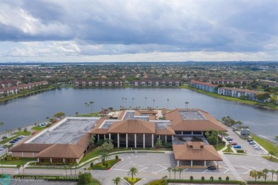 A beautiful lake view 2/2 unit on the top 4th floor located in on Flamingo Lakes Country Club in Florida - for sale on GolfHomes.com, golf home, golf lot