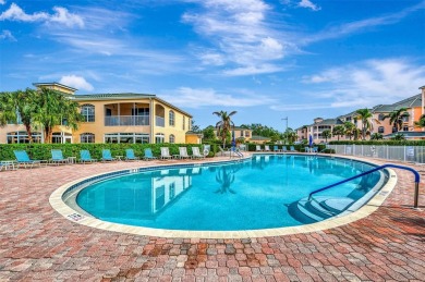 Appealing two bedroom, plus den, two bath condo with a two car on Capri Isle Golf Club in Florida - for sale on GolfHomes.com, golf home, golf lot