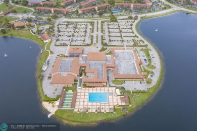 A beautiful lake view 2/2 unit on the top 4th floor located in on Flamingo Lakes Country Club in Florida - for sale on GolfHomes.com, golf home, golf lot