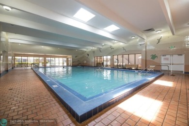 A beautiful lake view 2/2 unit on the top 4th floor located in on Flamingo Lakes Country Club in Florida - for sale on GolfHomes.com, golf home, golf lot