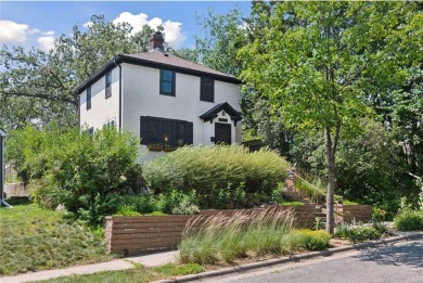 Welcome to this charming two-story home that blends old-world on Hiawatha Golf Course in Minnesota - for sale on GolfHomes.com, golf home, golf lot