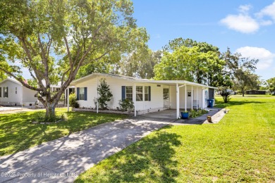 This 3 bedroom, 2 bath property is a lovely place to call homee on Brookridge Country Club in Florida - for sale on GolfHomes.com, golf home, golf lot