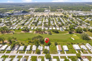 This 3 bedroom, 2 bath property is a lovely place to call homee on Brookridge Country Club in Florida - for sale on GolfHomes.com, golf home, golf lot