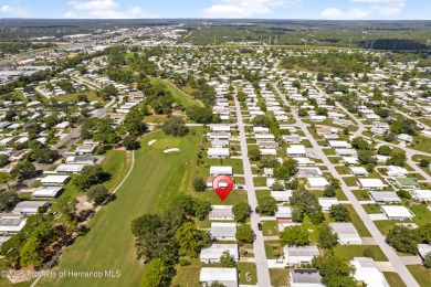 This 3 bedroom, 2 bath property is a lovely place to call homee on Brookridge Country Club in Florida - for sale on GolfHomes.com, golf home, golf lot