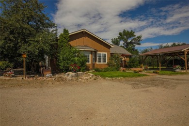 Bordered by the peaceful waters of Tenmile Creek, this 3.23-acre on Green Meadow Country Club in Montana - for sale on GolfHomes.com, golf home, golf lot
