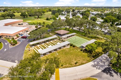 This 3 bedroom, 2 bath property is a lovely place to call homee on Brookridge Country Club in Florida - for sale on GolfHomes.com, golf home, golf lot