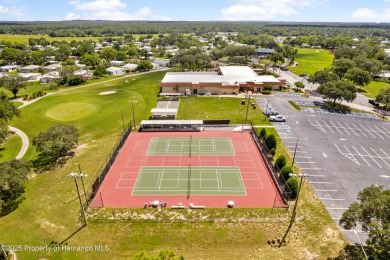 This 3 bedroom, 2 bath property is a lovely place to call homee on Brookridge Country Club in Florida - for sale on GolfHomes.com, golf home, golf lot