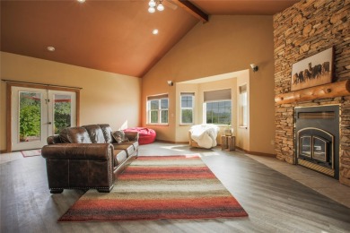 Bordered by the peaceful waters of Tenmile Creek, this 3.23-acre on Green Meadow Country Club in Montana - for sale on GolfHomes.com, golf home, golf lot