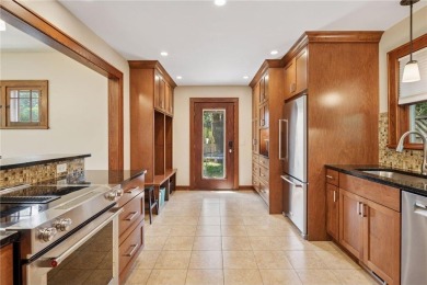 Welcome to this charming two-story home that blends old-world on Hiawatha Golf Course in Minnesota - for sale on GolfHomes.com, golf home, golf lot