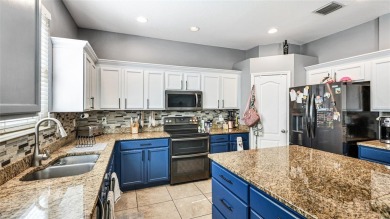 Short Sale. 4 bedroom 3 1/2 bath pool home & almost 3000 sq ft on Imperial Lakewoods Golf Club in Florida - for sale on GolfHomes.com, golf home, golf lot