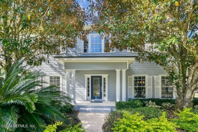 This elegant two story sits on a spectacular half-acre corner on St. Johns Golf and Country Club in Florida - for sale on GolfHomes.com, golf home, golf lot