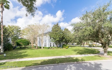 This elegant two story sits on a spectacular half-acre corner on St. Johns Golf and Country Club in Florida - for sale on GolfHomes.com, golf home, golf lot